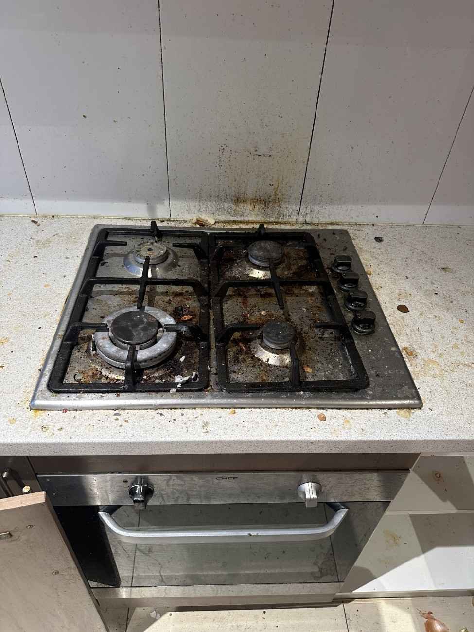 Before stovetop and kitchen benchtop cleaning by an end of lease cleaning service in Sydney
